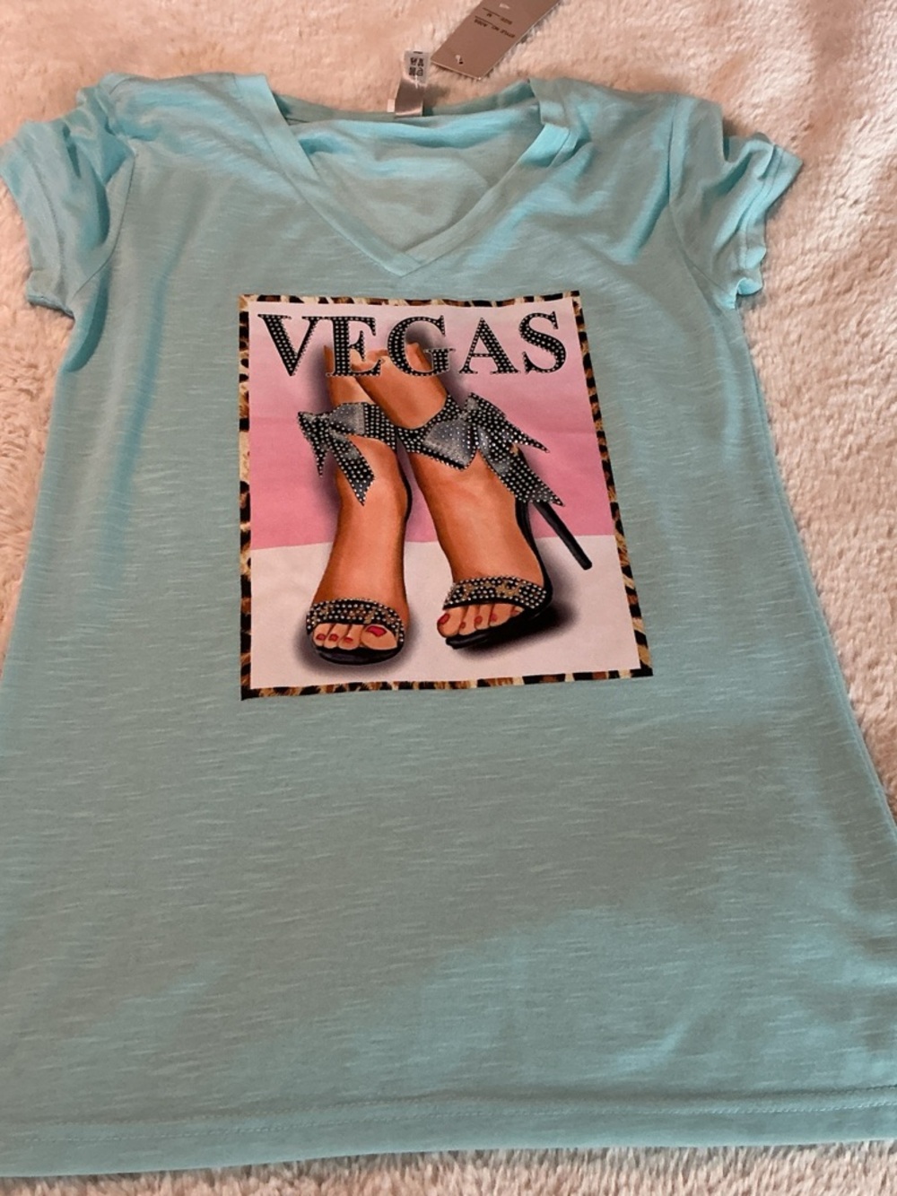 VEGAS Graphic V‑Neck Tee in Aqua